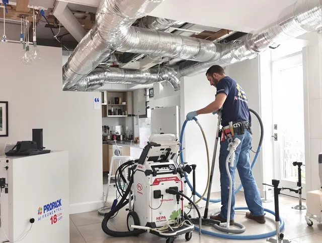 Groton Air Duct Cleaning technician performing advanced pure duct cleaning with specialized equipment in Groton